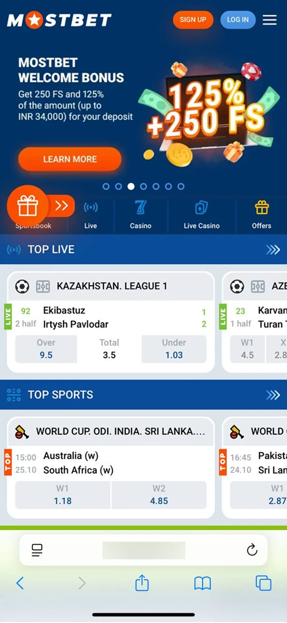 Opening official Mostbet website on iPhone Safari.